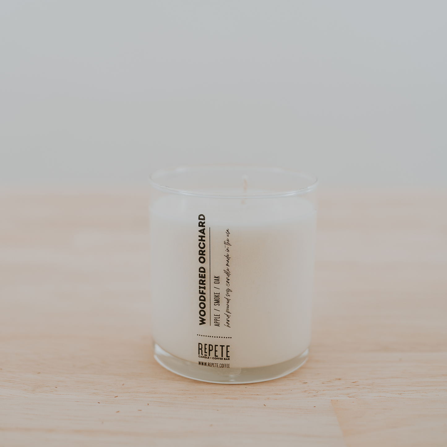 Woodfired Orchard nine ounce candle from Repete Candle and Coffee Bar