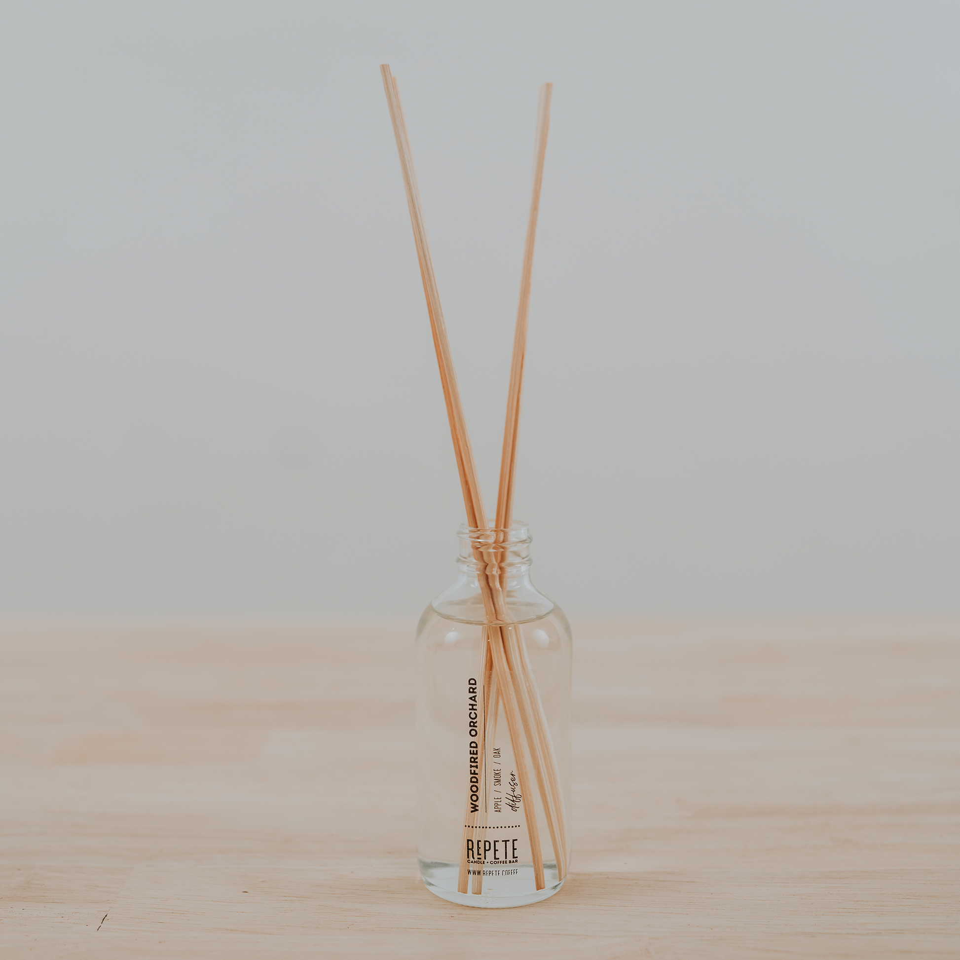 Woodfired Orchard diffuser from Repete Candle and Coffee Bar